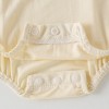 Infant carrier and diaper coveralls