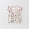 Baby romper with floral pattern