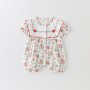 Baby romper with floral pattern