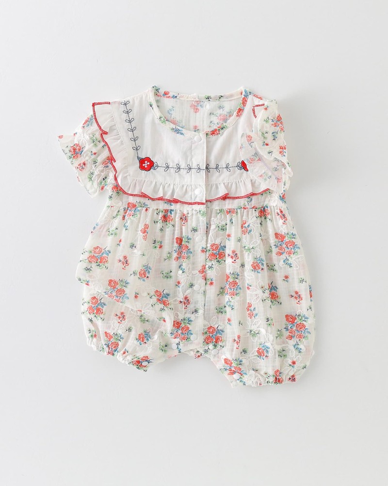 Baby romper with floral pattern