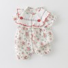 Baby romper with floral pattern