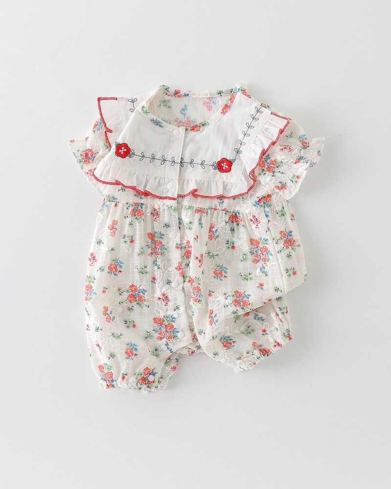 Baby romper with floral pattern