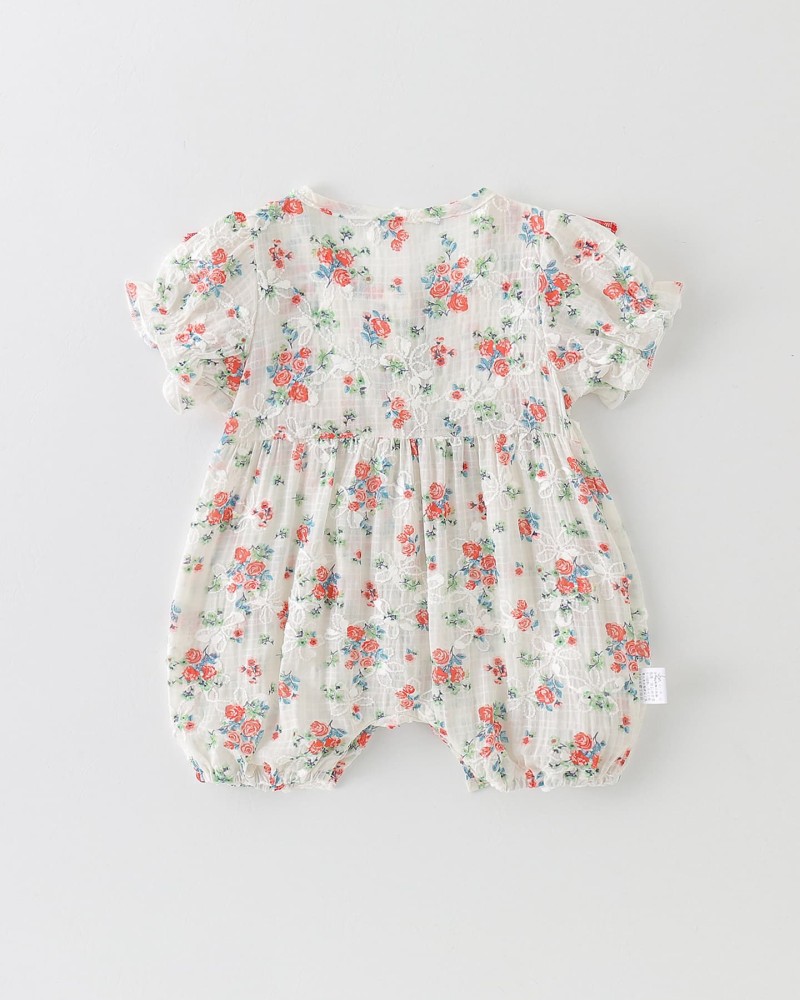 Baby romper with floral pattern