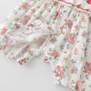Baby romper with floral pattern