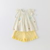 Cream-colored flutter sleeve top and matching set for girls