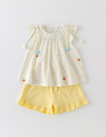 Cream-colored flutter sleeve top and matching set for girls