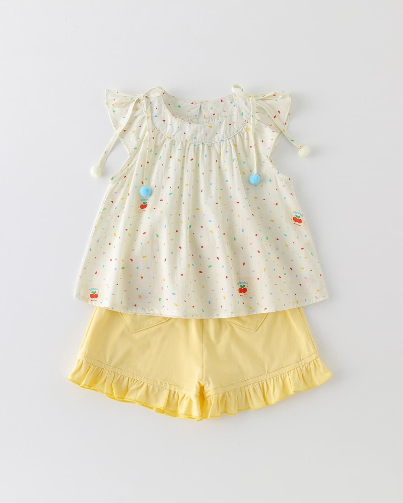 Cream-colored flutter sleeve top and matching set for girls