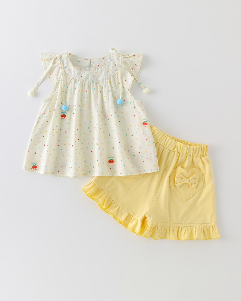 Cream-colored flutter sleeve top and matching set for girls