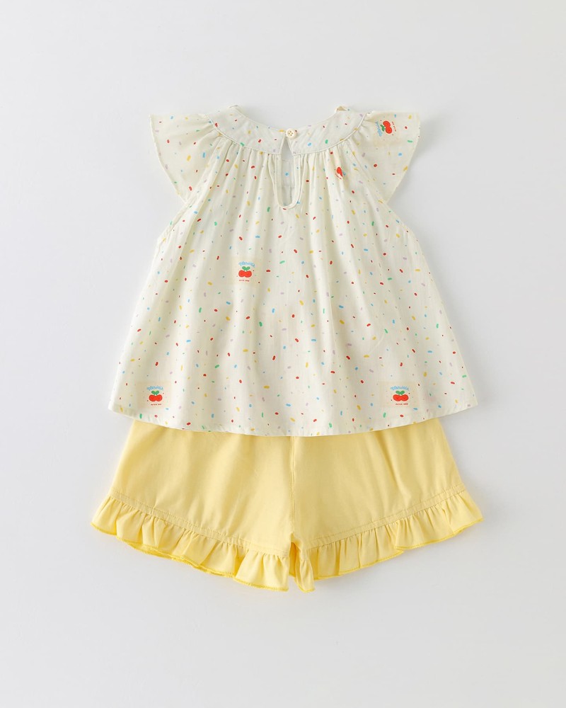 Cream-colored flutter sleeve top and matching set for girls