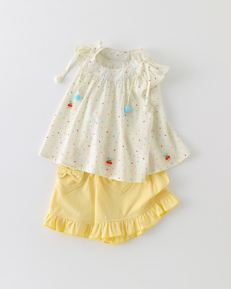 Cream-colored flutter sleeve top and matching set for girls